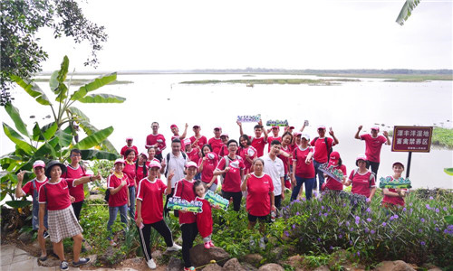 安利志愿者走进海口潭丰洋湿地公园 倡导更多人参与“湿地保护”